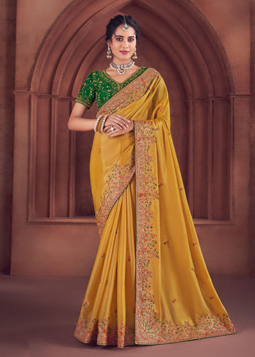 Yellow Heavy Embroidered Organza Silk Saree