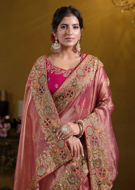 Pink Heavy Embroidered Wedding Saree In Georgette