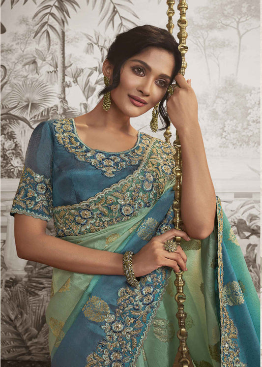 Teal Blue Heavy Embroidered Silk Saree